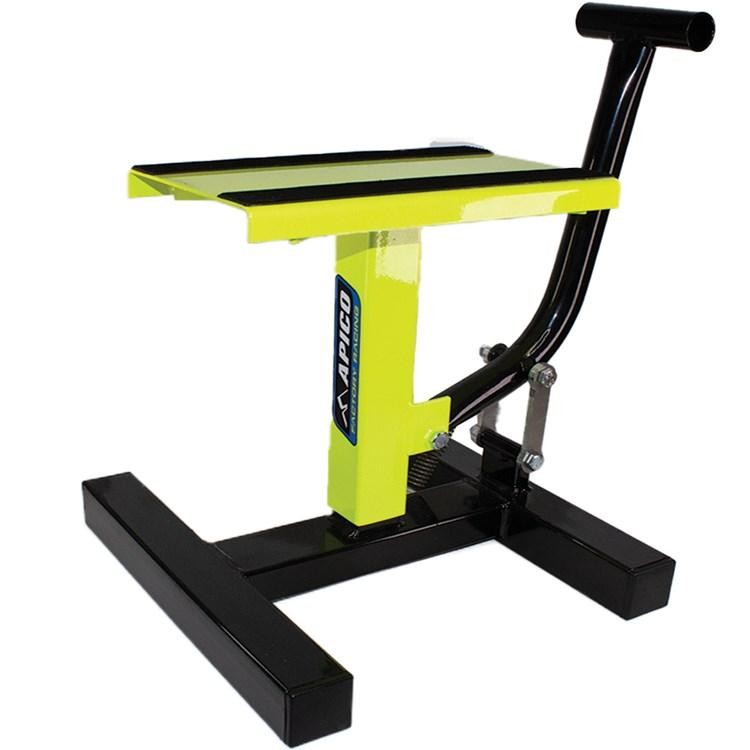 Yellow Apico Factory Lift Paddock Stand featuring a sturdy black base, a flat top with rubber grip, and a handle for easy maneuverability.