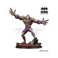 Joker Titan Overdrive miniature features a muscular figure in purple and green, with exaggerated limbs and a manic expression, standing on a rocky base, part of the Batman Miniature Game.