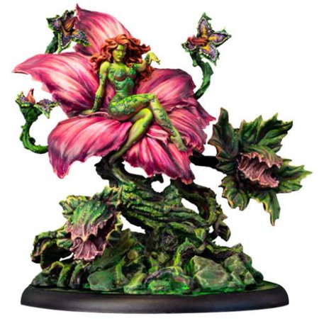 Poison Ivy miniature features a vibrant green figure with red hair, sitting on a large pink flower, surrounded by green foliage and butterflies, crafted in detailed resin.