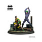 The Joker figure features vibrant purple and green colors, wielding a bat, while a Robin figure in a green and yellow costume stands ready, set on a detailed base.