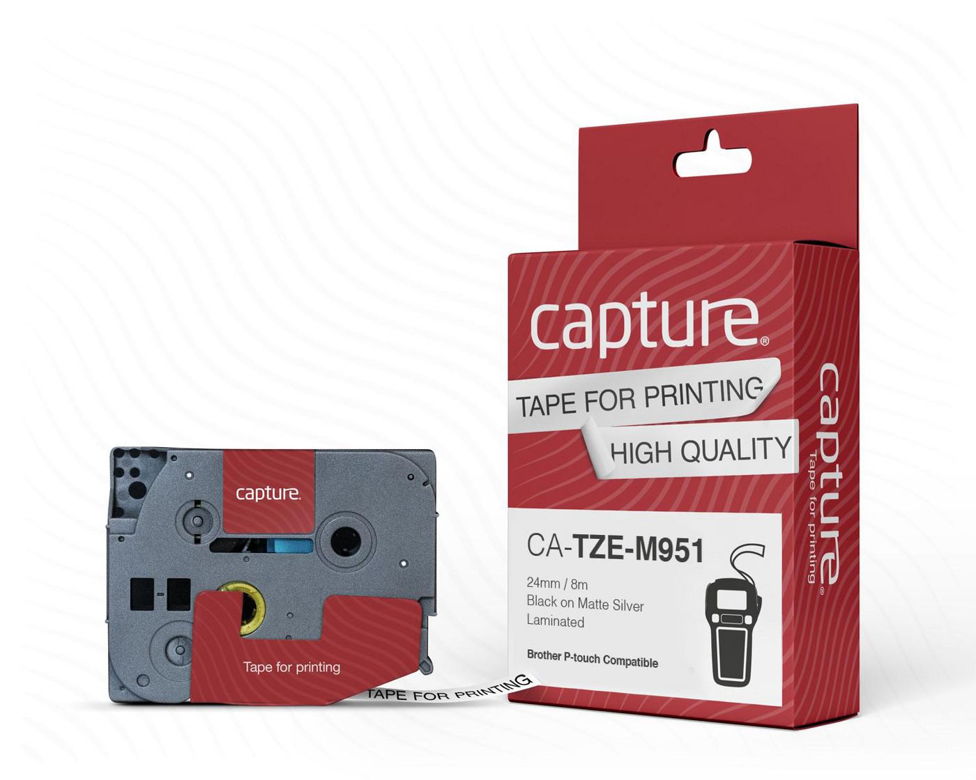 Black tape cassette with a matte silver finish, labeled "CAPTURE" and "24mm X 8m," displayed alongside a red and white box featuring product details and compatibility information.