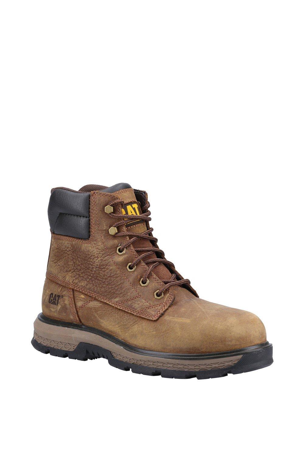 Brown leather safety boot featuring a steel toe, padded collar, and durable rubber sole, with yellow "CAT" logo on the tongue and side.
