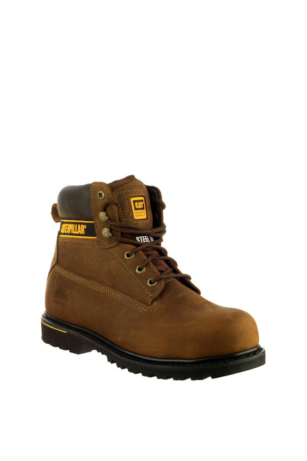 Brown leather safety boot featuring a steel toe, padded collar, and durable rubber sole, with Caterpillar branding on the tongue and side.