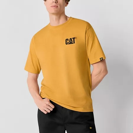 Mustard yellow cotton t-shirt featuring the "CAT" logo on the left chest and a small logo on the sleeve, styled with a relaxed fit.