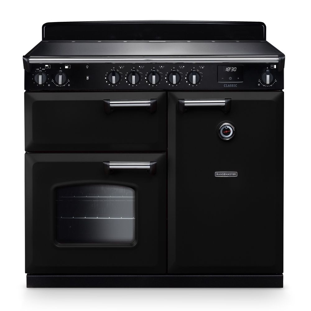 Classic 100cm induction cooker in black and chrome, featuring a sleek design, multiple control knobs, a large oven door, and a smooth cooktop surface.