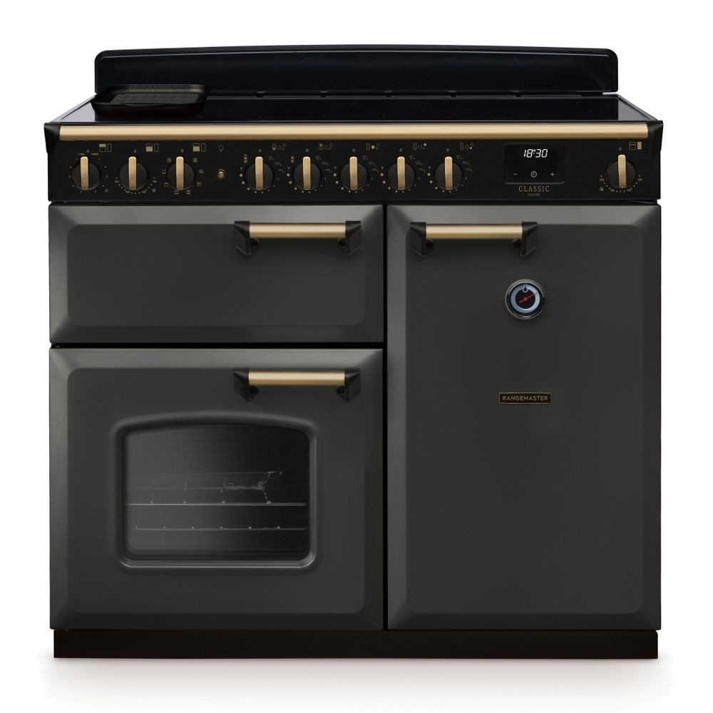 Classic Deluxe 100cm induction range cooker in slate with antique brass accents, featuring a smooth top, multiple knobs, and a large oven with a glass door.