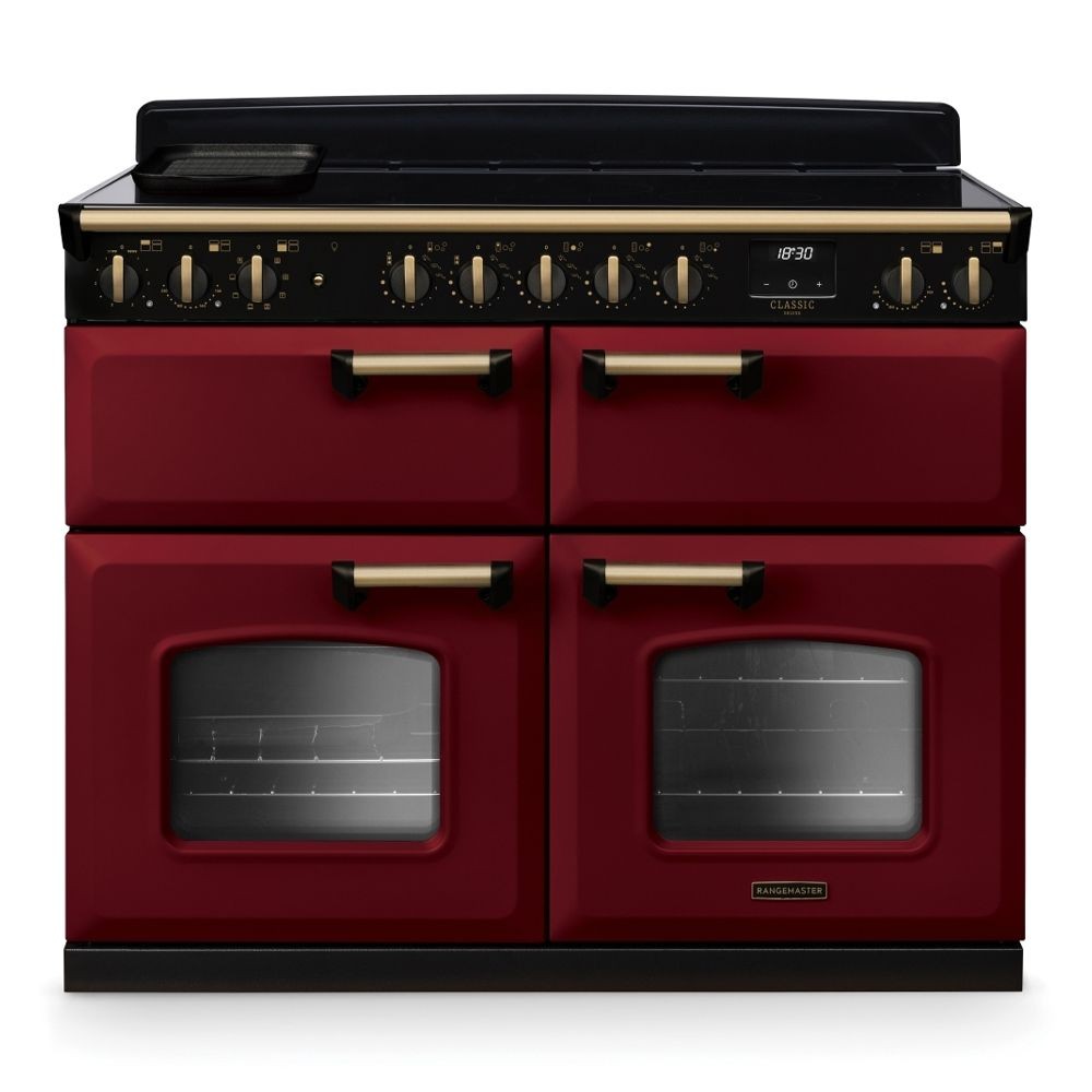 Classic Deluxe 110cm BC induction range cooker in Bordeaux with antique brass accents, featuring four ovens, a sleek black top, and elegant control knobs.