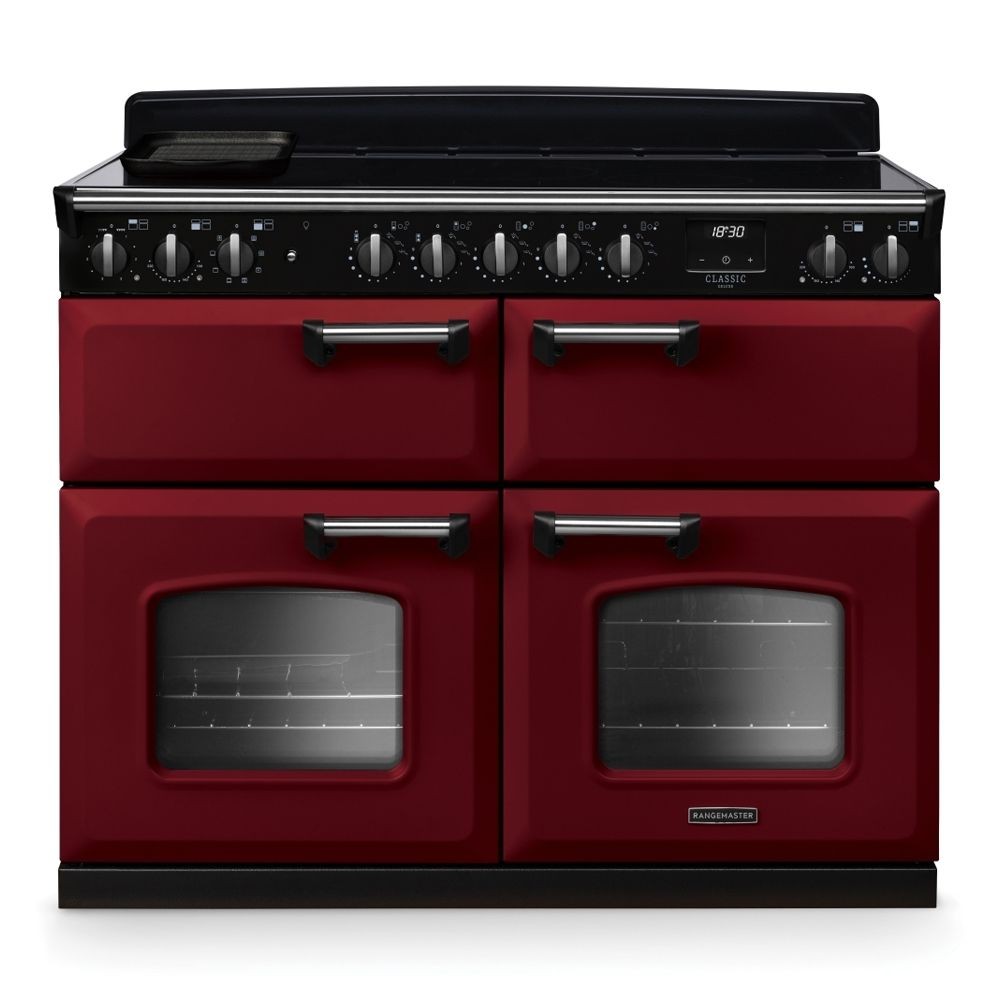 Classic Deluxe 110cm BC induction range cooker in Bordeaux red and chrome, featuring four gas burners, two large ovens with glass doors, and a sleek black control panel.
