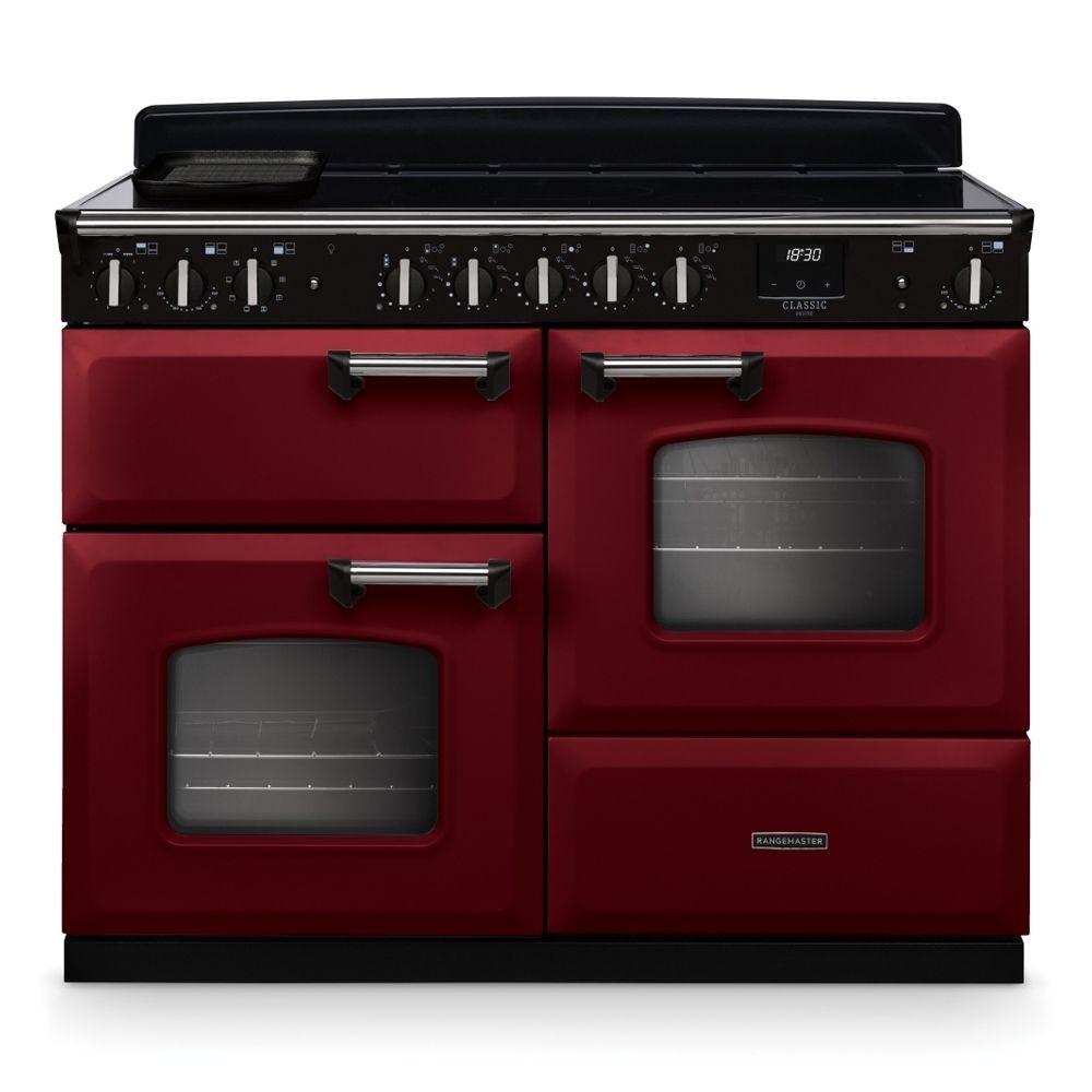 Classic Deluxe 110cm OC induction range cooker in Bordeaux red and chrome, featuring two ovens, six control knobs, and a sleek black induction hob.