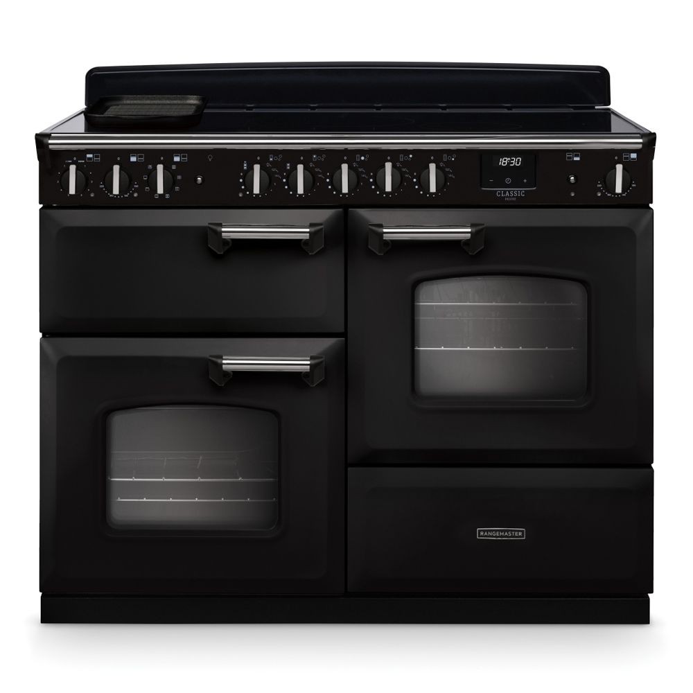 Classic Deluxe 110cm induction range cooker in charcoal black and chrome, featuring dual ovens, multiple control knobs, and a sleek, modern design.