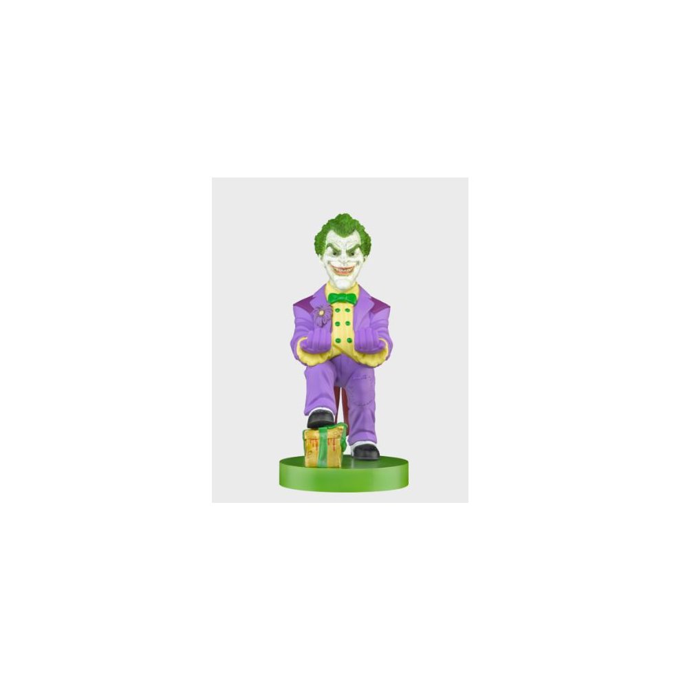 DC Comic Joker Cable Guy features a vibrant green-haired Joker in a purple suit, holding a green gaming controller, standing on a circular green base with two yellow barrels.