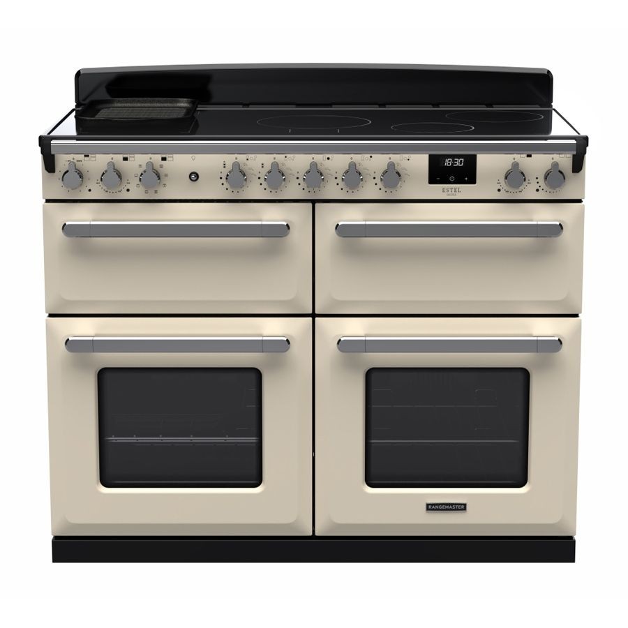 Pale cream and chrome Rangemaster Estel Deluxe 110cm BC induction range cooker featuring four ovens, multiple control knobs, and a sleek black induction cooktop.