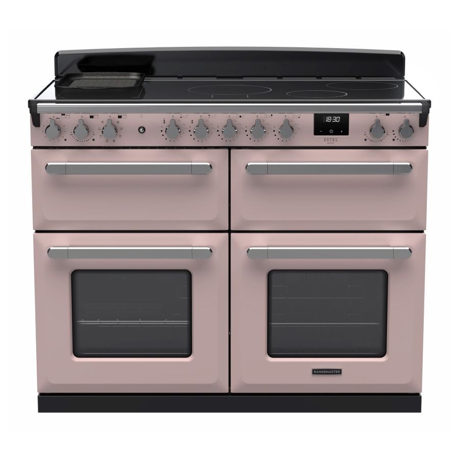 Pale pink and chrome 110cm BC induction range cooker featuring four ovens, multiple control knobs, and a sleek black cooktop with induction zones.