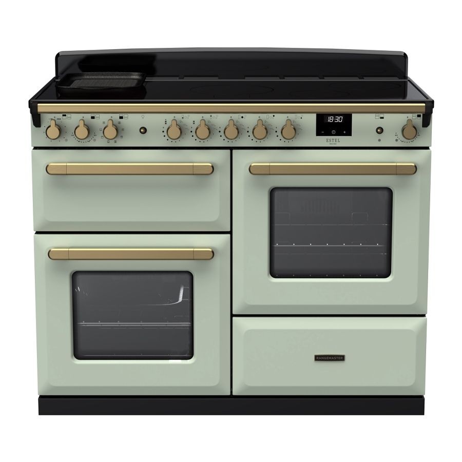 Mint green induction range cooker with antique brass accents, featuring four burners, two ovens, and a digital display for precise cooking control.