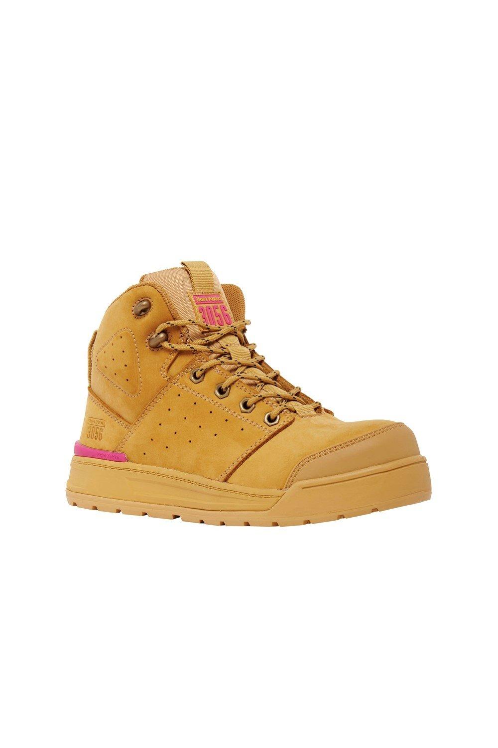 Wheat-colored women's safety boot featuring a side zip, padded collar, and pink accents, made from durable materials for comfort and protection.