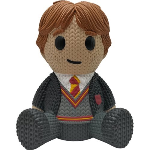 Collectible Ron Weasley vinyl figure with brown hair, wearing a gray sweater, red and gold tie, and a black robe, featuring textured detailing and large round eyes.