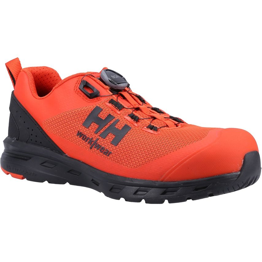 Unisex Chelsea Evolution safety shoes in dark orange with aluminium toe, featuring a black sole, lace-free design, and Helly Hansen Workwear logo on the side.