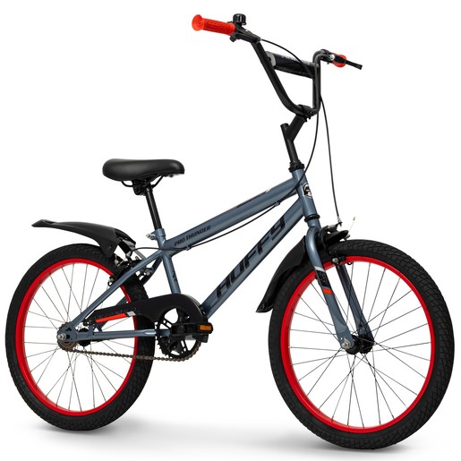 A grey 20-inch Huffy Pro Thunder bike featuring red accents on the tires and handlebars, a comfortable black seat, and a sturdy frame designed for durability.