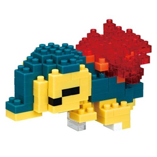 Cyndaquil is depicted as a small, blocky figure made of colorful plastic pieces, featuring a blue body, yellow belly, and a vibrant red, flame-like back.