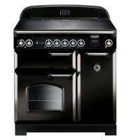 Classic 90cm induction range cooker in black with chrome trim, featuring six control knobs, a digital display, and a large oven door with a window.