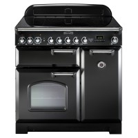 Classic 90cm black induction range cooker with chrome trim, featuring five control knobs, a large viewing window, and dual ovens for versatile cooking options.