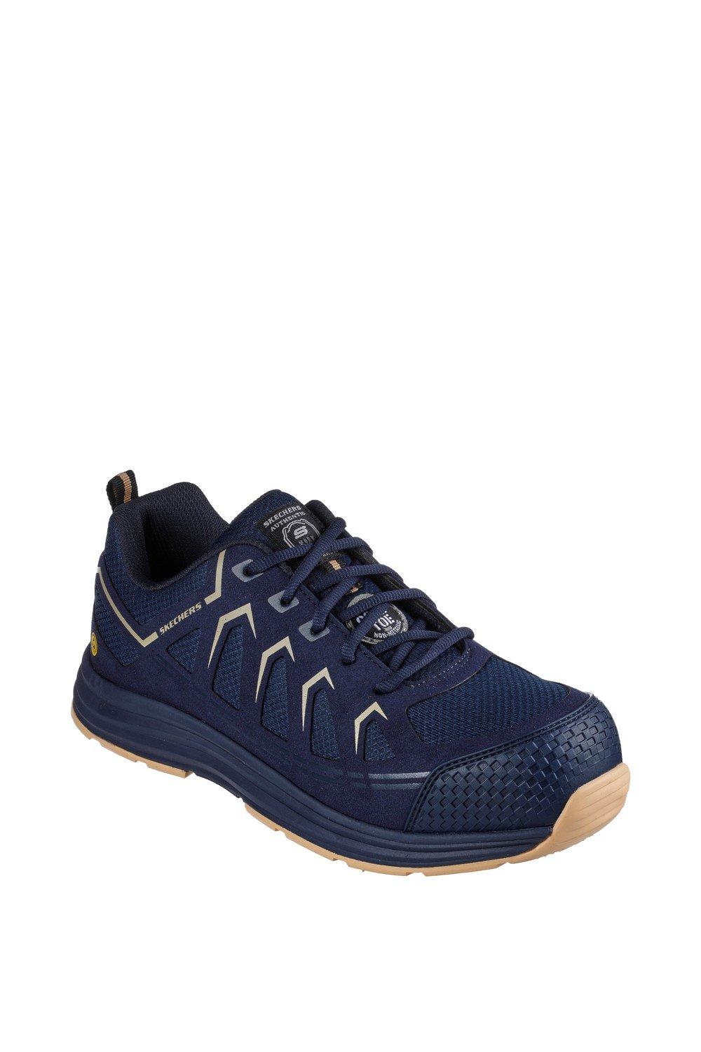 Navy and tan Skechers Workwear Malad II textile safety trainers featuring a breathable mesh upper, reinforced toe cap, and slip-resistant rubber sole.