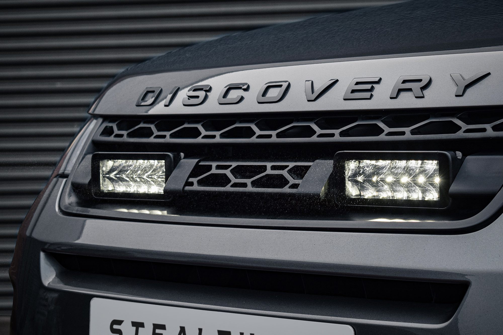 Stealth LED integration kit for Land Rover Discovery Sport, featuring two 7-inch luminous LED lights with a sleek black finish and high-intensity output of 10,080 lumens.