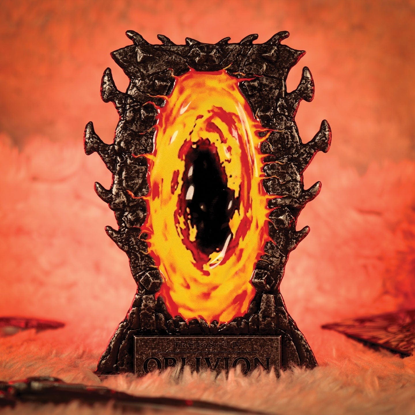 A detailed, fiery orange and black Oblivion gate ingot featuring a swirling portal design, framed by dark, jagged edges and the word "OBLIVION" at the base.