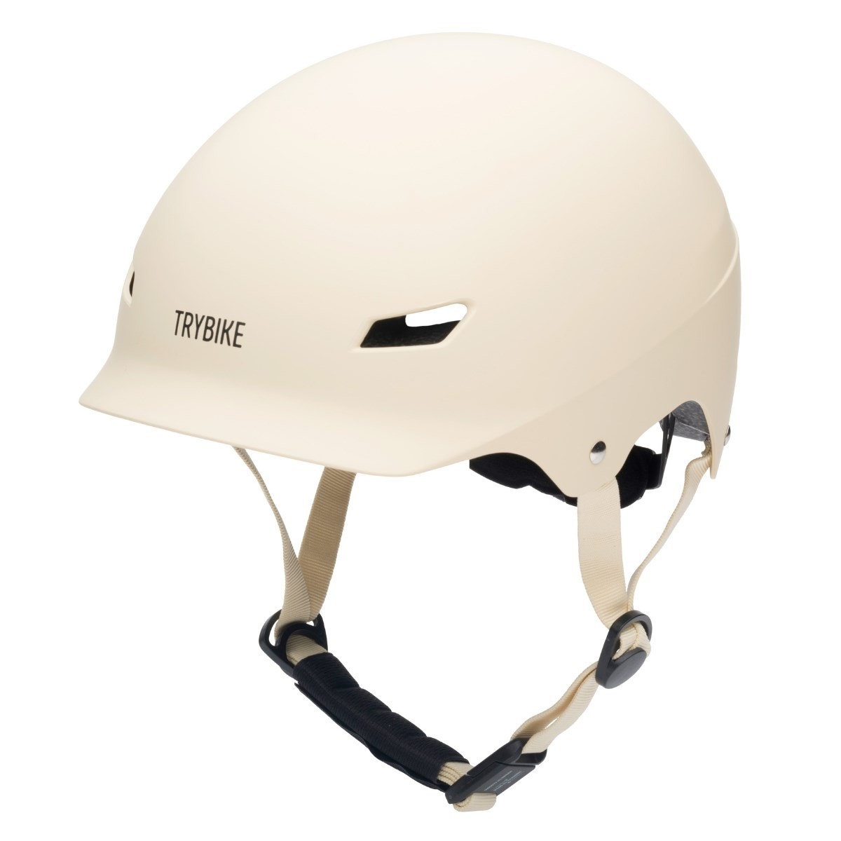 Matte cream helmet by Trybike in small/medium size, featuring ventilation holes, adjustable chin strap, and a sleek, minimalist design.