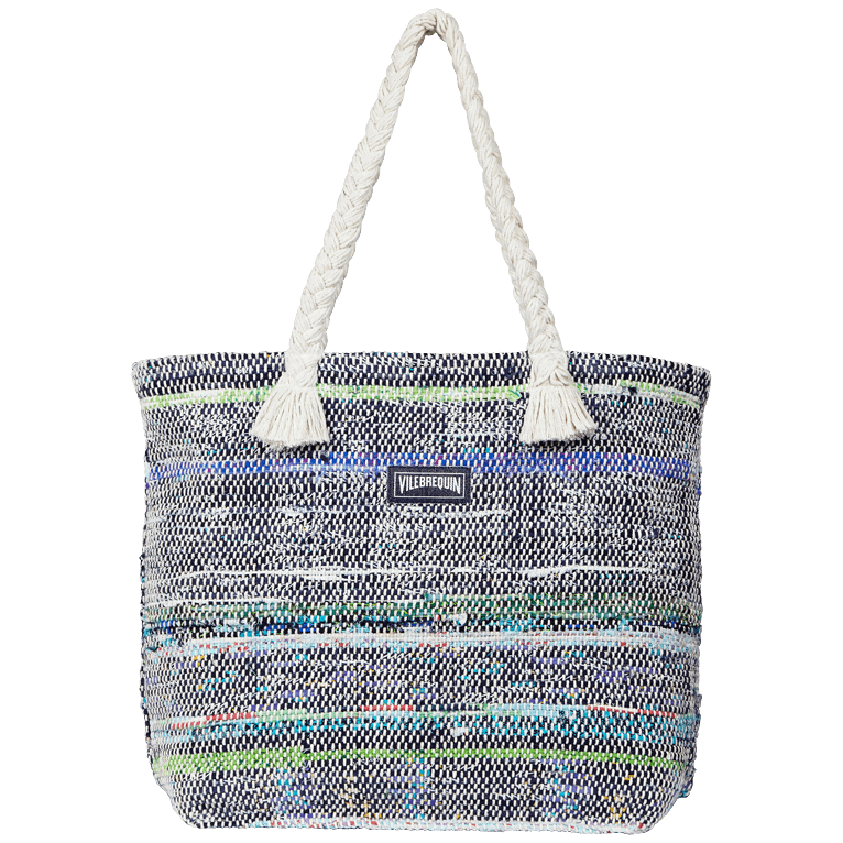 Large multi-colored beach bag made of woven bamboo material, featuring a braided rope handle and tassels, with a Vilebrequin logo patch on the front.