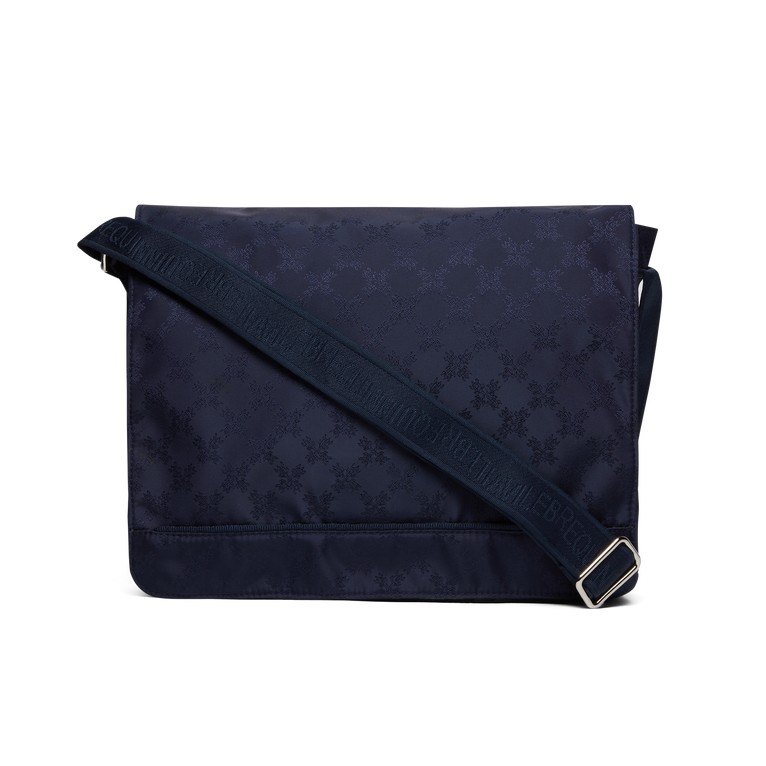 Blue messenger bag featuring a turtle monogram pattern, made from durable material, with an adjustable strap and a sleek, minimalist design.