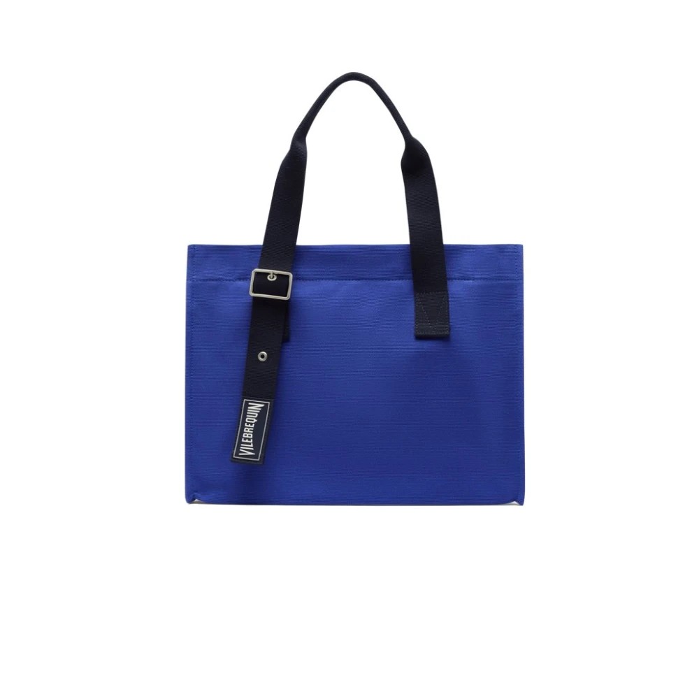 Solid blue cotton beach bag by Vilebrequin, featuring black handles and a metal buckle detail, designed for versatile beach use, size OSFA.