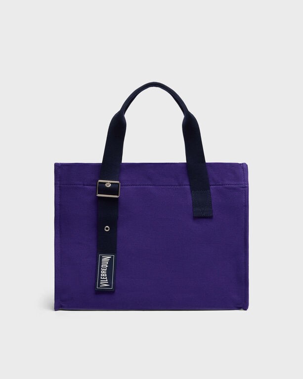 Purple cotton beach bag with a solid design, featuring two sturdy handles and a black strap with a metal buckle, labeled with the Vilebrequin logo.