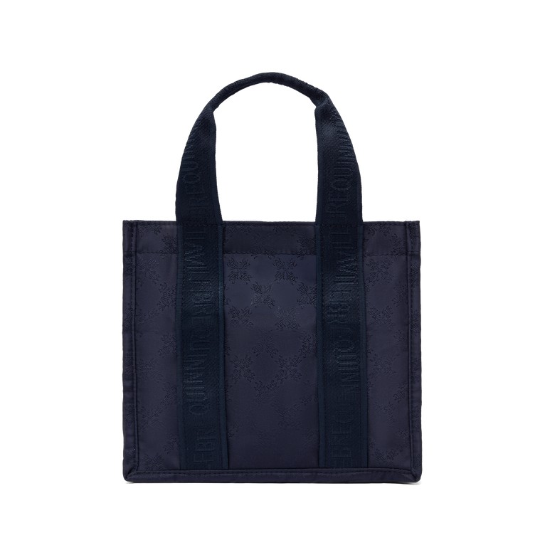 Blue mini travel bag by Vilebrequin featuring a turtle monogram design, sturdy fabric, dual handles, and a spacious interior, ideal for beach outings.