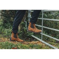 Brown Amblers Aldingham Dealer Boot, size 8, with elastic side panels and rugged sole, worn by person climbing a gate.