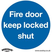 Blue circular sign with white text "Fire door keep locked shut," Sealey branding, pack of 10 rigid plastic signs.