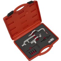 Red Sealey timing tool kit with various metal components in a black foam insert, housed in a sturdy red case.
