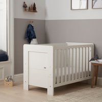 White Tutti Bambini mini cot bed with slatted sides and solid headboard in a modern nursery setting.