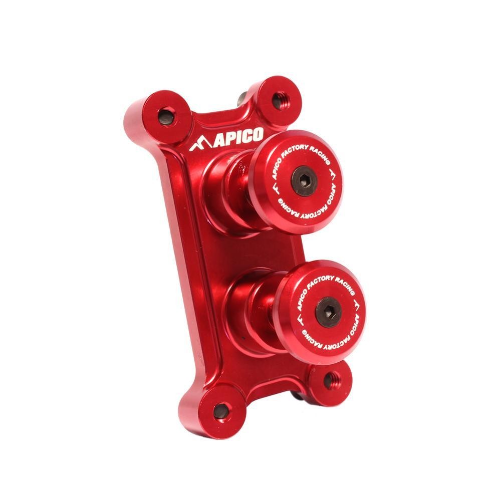 Red anodized aluminum dual launch control button assembly featuring two prominent buttons with engraved branding, designed for enhanced performance in motorsport applications.