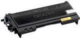 Black toner cartridge with a smooth plastic exterior, featuring the "Brother" logo prominently on top and a yellow label on the side for identification.