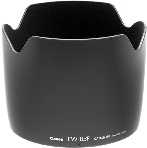 Black Canon ET-83F (WIII) lens hood with a matte finish, featuring a wide, flared design and soft interior to reduce lens flare, marked with "CANON INC. MADE IN JAPAN."
