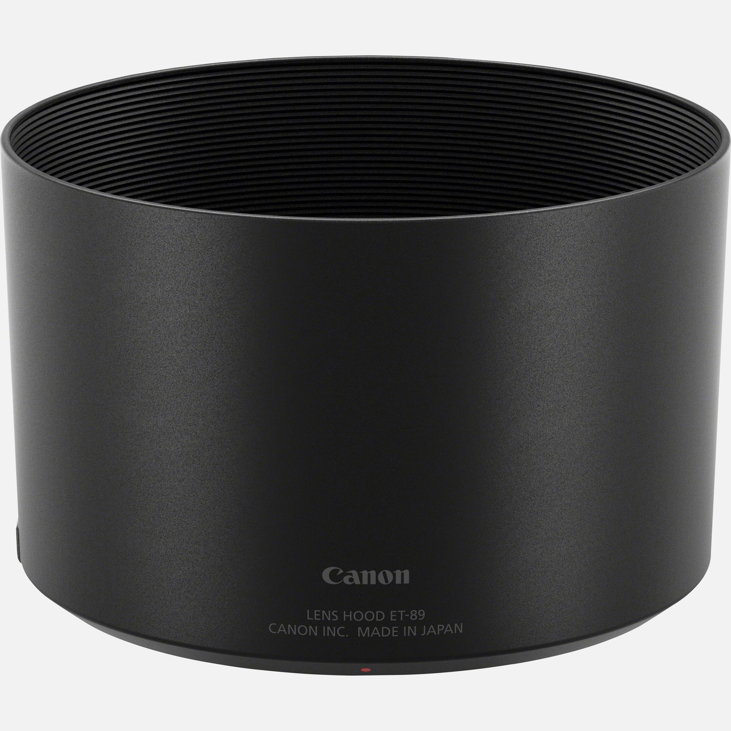 Black Canon ET-89 lens hood with a cylindrical shape, featuring a matte finish and inner ribbing to reduce lens flare, marked with "Canon Inc. Made in Japan" at the base.