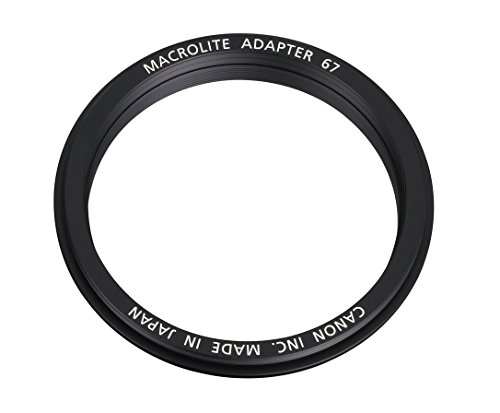 Black Canon Macrolite Adapter 67 with engraved white text; designed for attaching macro lighting to lenses with a 67mm filter thread.