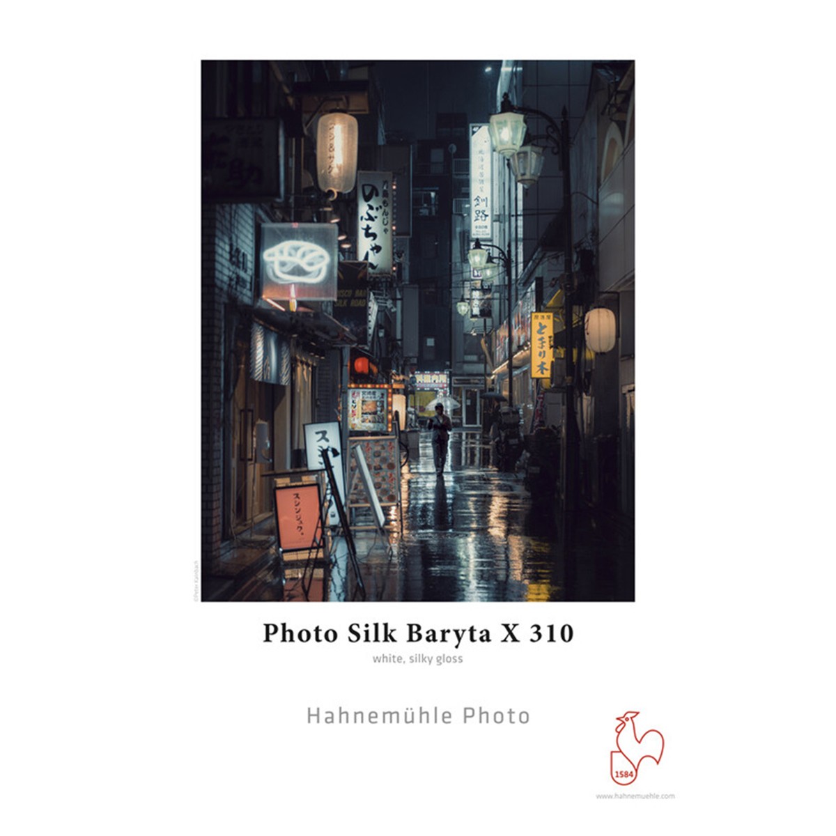 White, silky gloss paper roll labeled "Photo Silk Baryta X 310," measuring 24 inches by 5 meters, featuring a sleek, smooth texture ideal for high-quality prints.