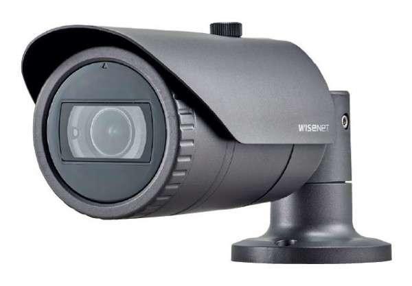 Gray bullet-style security camera with a cylindrical lens, adjustable focus ring, and a sturdy mounting base, designed for indoor surveillance by Hanwha.
