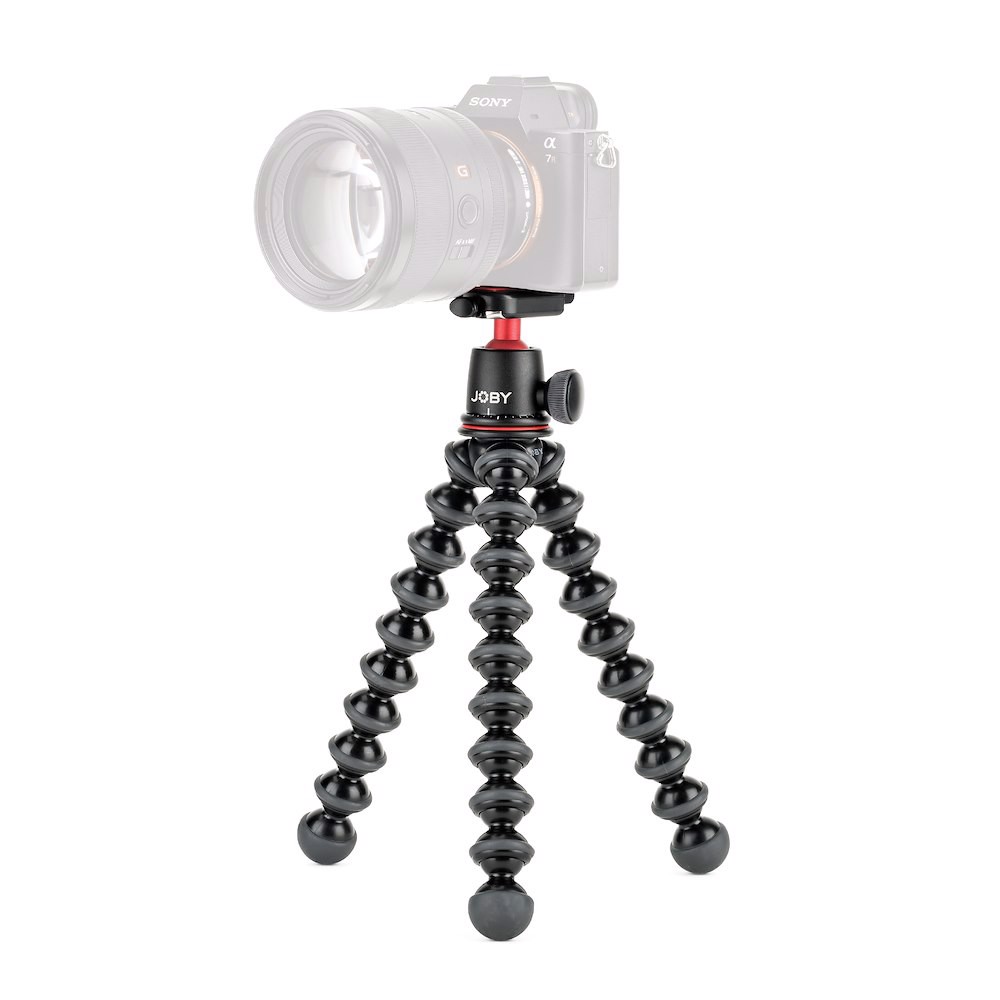 Black Joby GorillaPod 3K Kit tripod featuring flexible, bendable legs, a sturdy ball head, and a red accent, designed for digital and film cameras.