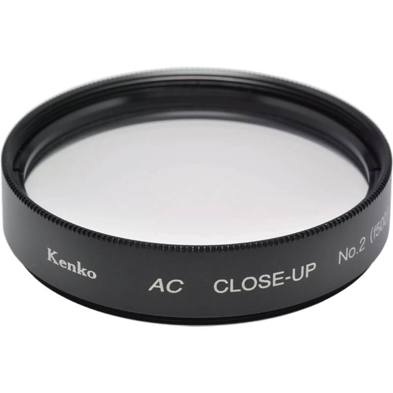 Black 52mm Kenko AC CLOSE-up No.2 MC filter with a smooth rim and clear glass, designed for macro photography to enhance close-up shots.