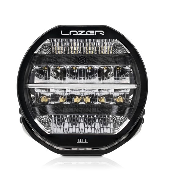 Round LED light featuring a black housing with a clear lens, showcasing multiple bright LED bulbs and a sleek design, labeled "LAZER" and "SENTINEL ELITE."