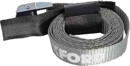Grey Oxford cam strap made of durable material, featuring a metal buckle and a textured surface, coiled neatly for easy storage.