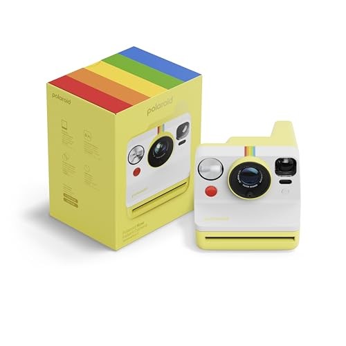 Yellow Polaroid Now Generation 3 Instant Camera with a white front, rainbow stripe, and red button, next to its matching yellow packaging.